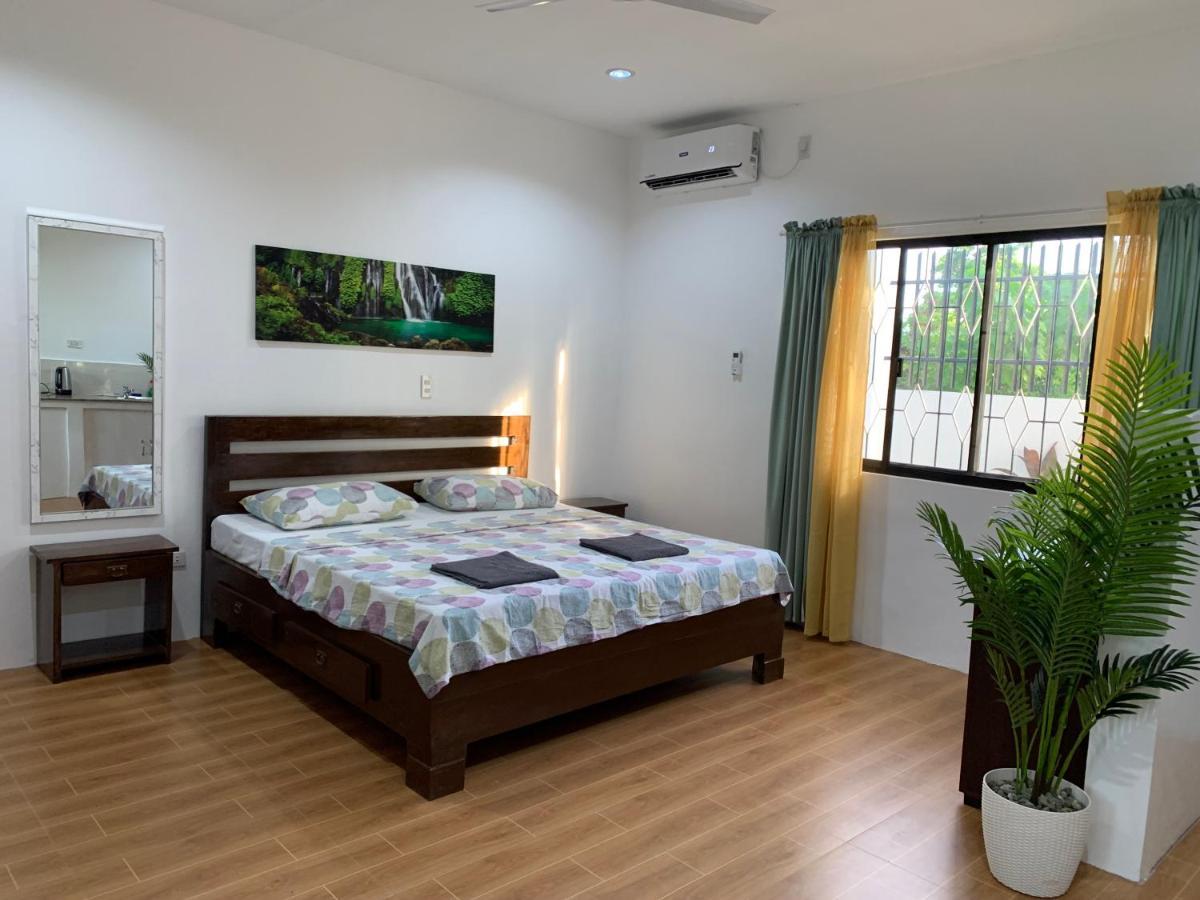 Palm Tree Lodge Moalboal Buitenkant foto